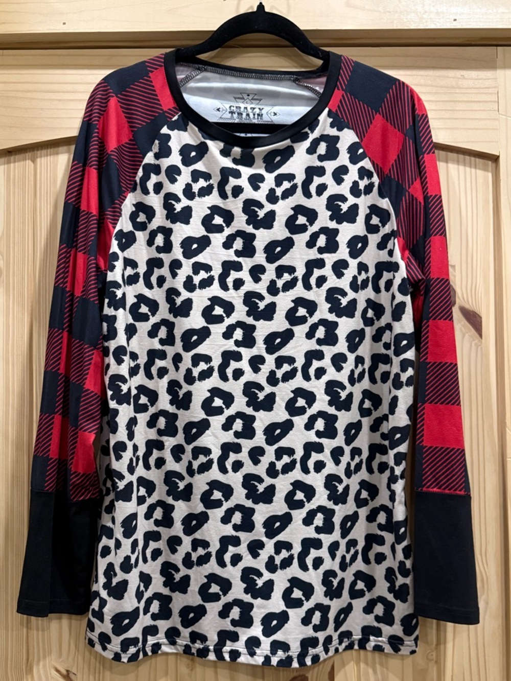 Crazy Train Black & White Leopard Print Top with Red Buffalo Plaid Sleeves